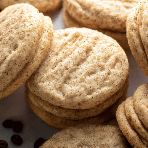 Coffee sugar cookies with glaze on parchment paper
