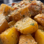 Crockpot Garlic Parmesan Chicken and Potatoes served with melted mozzarella